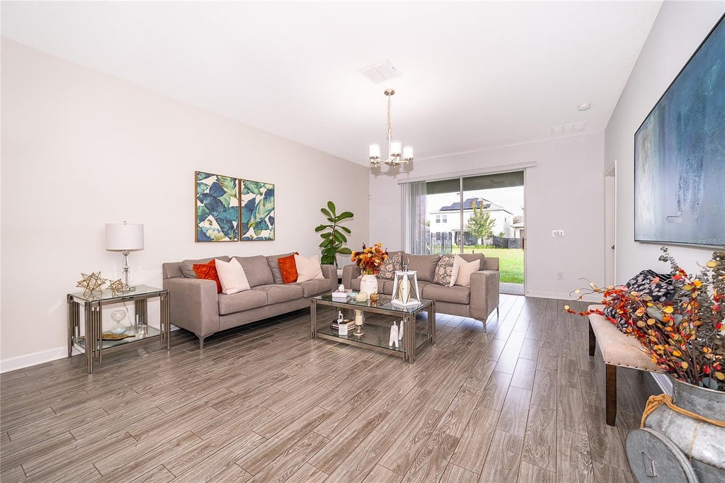 Photo of 12127 Imaginary Way, Orlando, FL 32832 (MLS # O6444318)