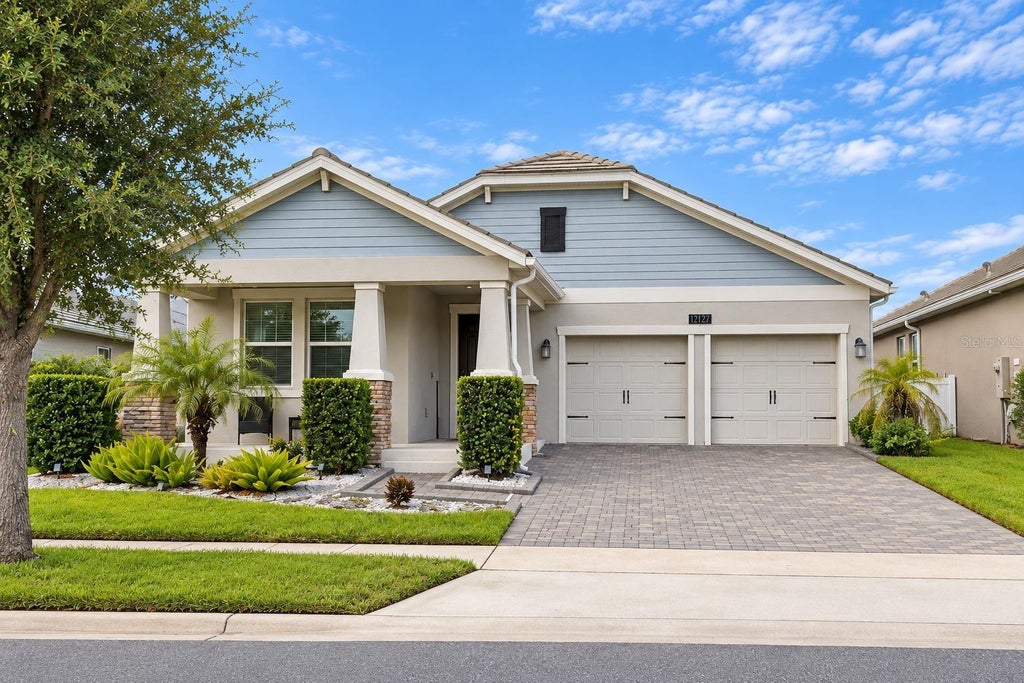 Photo of 12127 Imaginary Way, Orlando, FL 32832 (MLS # O6444318)
