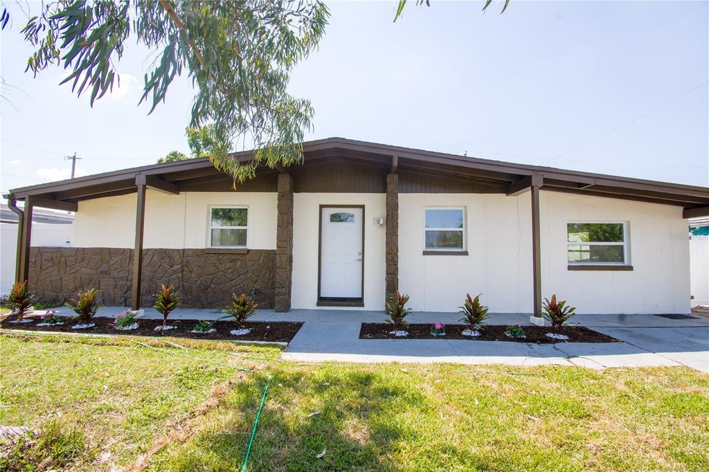 Photo of 8307 Libby Lane, Tampa, FL 33619 (MLS # TB8491444)