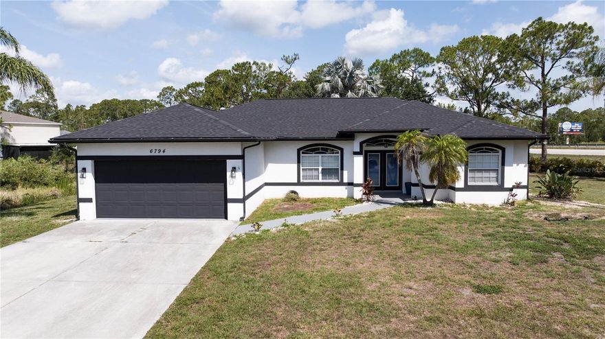 Short Sale. Spacious & Stylish Saltwater Pool Home on Nearly an Acre in North Port!

Welcome to your private Florida retreat! This beautifully updated 3-bedroom, 2.5-bathroom saltwater pool home offers over 2,000 square feet of living space and sits on a rare .79-acre lot, giving you the perfect blend of space, comfort, and modern design.

Step inside to discover a bright, open floorplan with luxury vinyl plank flooring throughout—durable, stylish, and easy to maintain. The heart of the home is a renovated kitchen featuring contemporary finishes, sleek cabinetry, and ample counter space, ideal for both casual meals and entertaining. Just off of the kitchen you'll find a spacious laundry room with additional storage and plenty of room for all of your laundry needs.

Natural light pours in through triple sliding glass doors, creating a seamless indoor-outdoor flow to your private pool and expansive backyard—perfect for enjoying the Florida sunshine.

The spacious master suite is a true retreat, boasting a huge walk-in closet and a luxurious ensuite bathroom with an oversized soaking tub, separate shower, and dual vanities.

Additional highlights include:

New Roof (2023) for peace of mind

New kitchen appliances

Split bedroom layout for privacy

Generously sized guest bedrooms

Oversized lot with room to roam, garden, or store recreational toys

Located in the vibrant and growing community of North Port, this home offers easy access to shopping, dining, schools, and Gulf Coast beaches—all while providing the peace and privacy of your own slice of paradise.

Don’t miss this unique opportunity to own a move-in ready pool home on nearly an acre—schedule your showing today!
