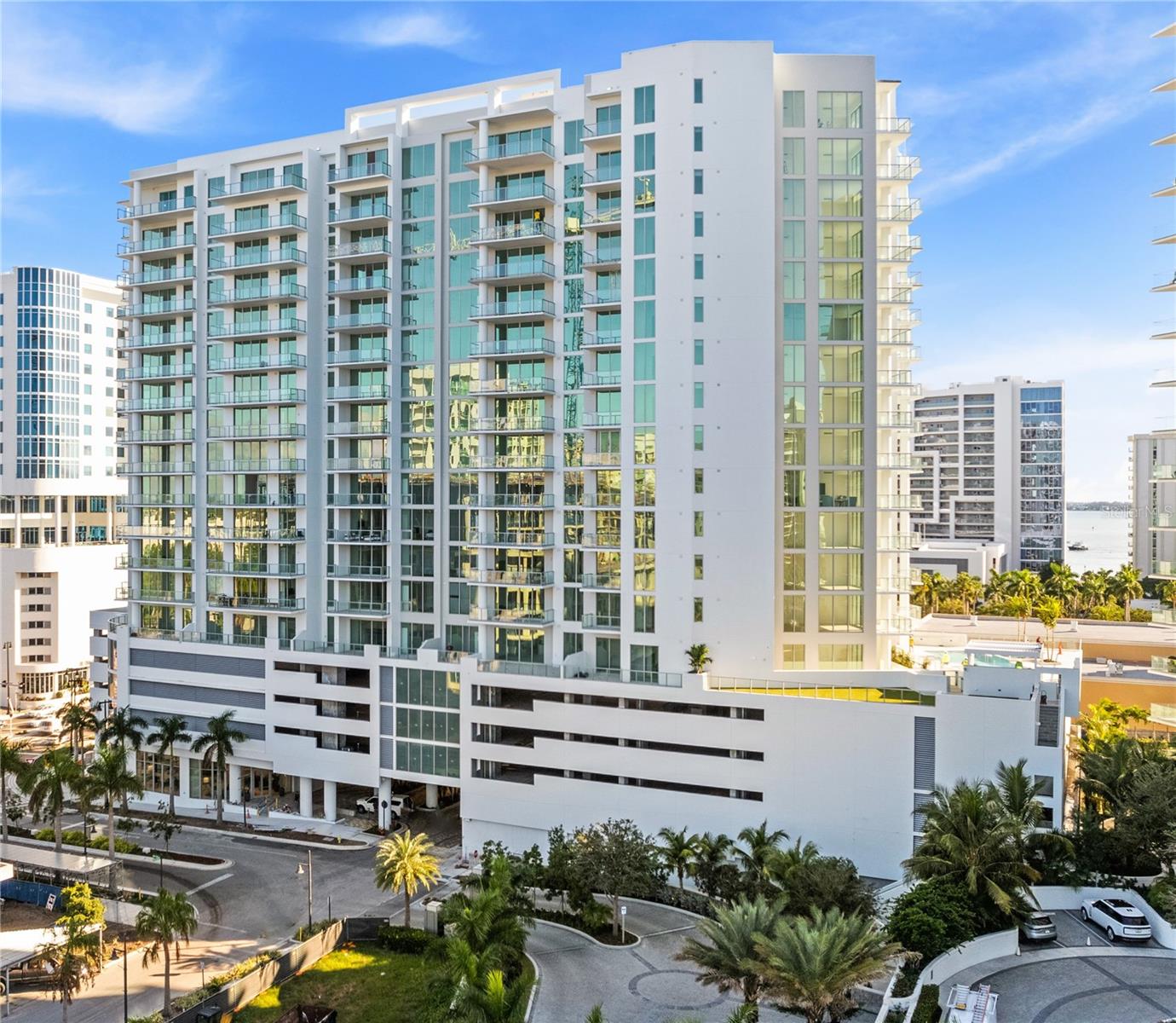 One or more photo(s) has been virtually staged. Welcome to Bayso, the epitome of luxury living in Downtown Sarasota's vibrant Sarasota Quay. Perched on the 12th floor, this premier condominium presents breathtaking views of Sarasota Bay and Sarasota Bay Park from every living space, bedroom, and the expansive lanai. With a meticulously designed floor plan, this residence boasts 2 bedrooms, a den, and 3 full bathrooms, creating an inviting space for both residents and guests. Upon entering, the panorama of the 12th-floor skyline immediately captures your attention, setting the tone for a residence that seamlessly blends indoor and outdoor living. The thoughtfully crafted open floor plan leads to a generously sized lanai that spans almost the entire width of the condo, maximizing the stunning views. The kitchen, a focal point of modern elegance,features European-inspired cabinets, quartz countertops, an oversized undermount sink, a large breakfast bar, and top-of-the-line stainless steel appliances. The master bedroom suite is a sanctuary of tranquility, offering not only breathtaking views but also designer touches with a modern farmhouse door, dual undermount sinks, a frameless shower, and a spacious walk-in closet with ventilated wood shelving. The guest suite provides privacy with its own ensuite bath, while the den serves as a versatile space for work, hobbies, or entertainment. Bayso doesn't just stop at the exceptional living spaces; it extends to an array of upscale amenities. A state-of-the-art fitness center and movement room, a stylish splash lounge with a catering kitchen, a community recreation area with a pool and spa, and a pergola-covered grilling station with picturesque views are just a few highlights. The condominium also features a dog park on the amenity level. The club room with a catering kitchen,conference rooms, and a well-designed lobby with a 24-hour attendant are located on the first level. Ensuring convenience, the property includes two parking spaces, owner storage on the first level, and bicycle storage. The Bayso condominium is not just a residence; it's a lifestyle,providing a luxurious haven close to downtown amenities, shopping, dining, and the beauty of St. Armands Circle and Lido Beach. Discover urban living at its finest in this premier Sarasota Quay address.