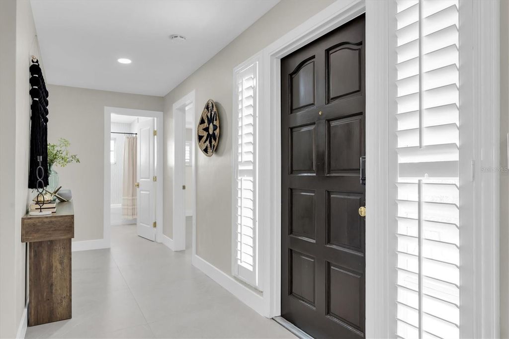 Photo of 10100 Paradise Boulevard, Treasure Island, FL 33706 (MLS # TB8471948)