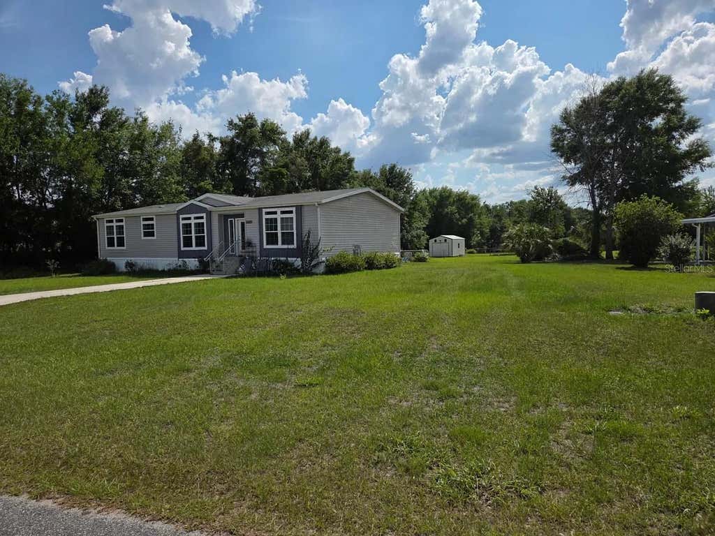 Photo of 13502 County Road 109e-1, Lady Lake, FL 32159 (MLS # G5116587)