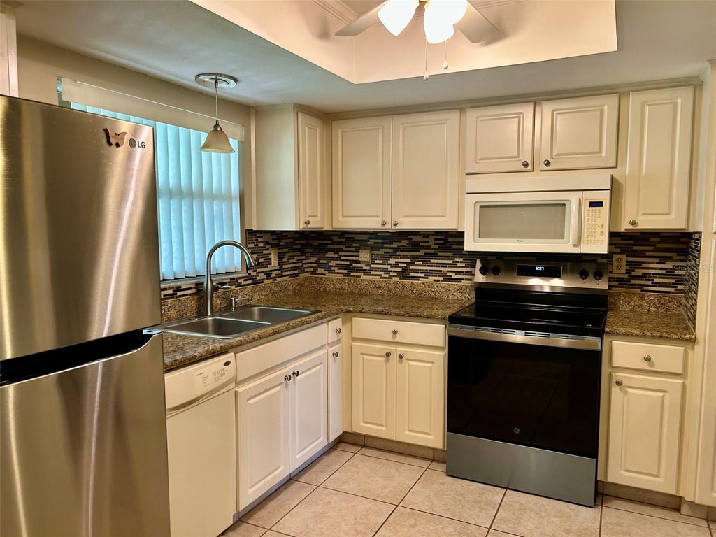 Photo of 2529 Oakleaf Lane #30C, Clearwater, FL 33763 (MLS # TB8543365)