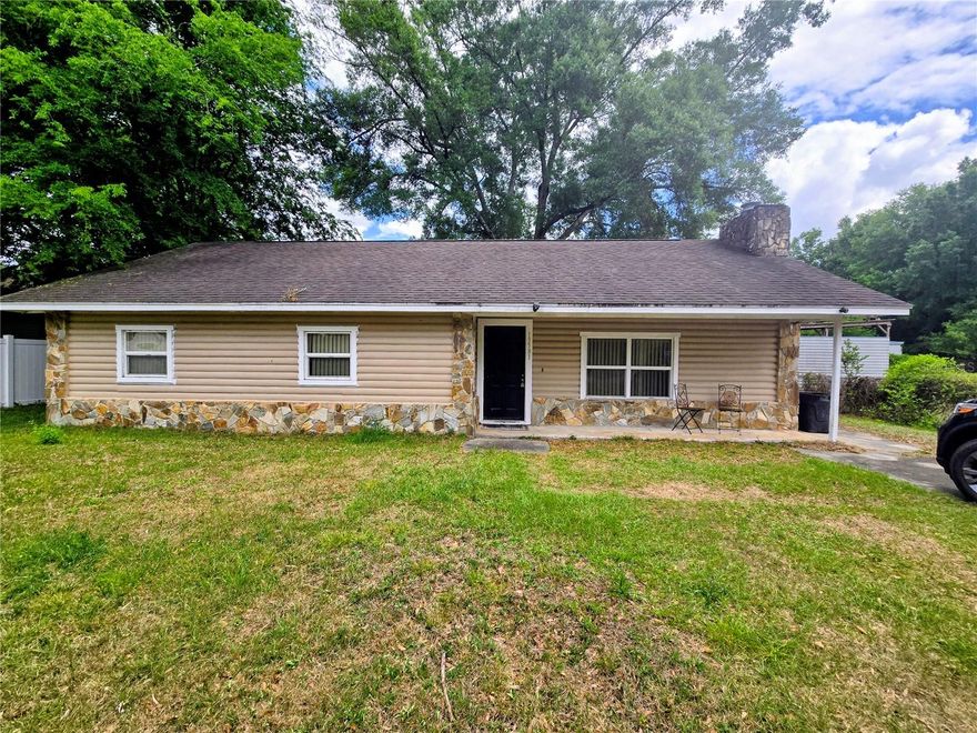 This 3 bedroom 2 full bath house in Belleview Heights Estate is waiting on its new owners.  Living/dining area share a stone fireplace, and cathedral wood beam ceiling.  The kitchen, beautiful maple cabinets, SS appliances, granite counter tops. Primary bedroom features an ensuite bath with walk-in shower. No carpet here, LVP flooring throughout with ceramic tile in the 2 full baths.  
No HOA or CDD'S...The house is conveniently located just minutes from dining, shopping, medical, and banking all approximately within 2-5 miles making this a great Summerfield location with everyday conveniently located minutes from The Villages, Ocala, Belleview, quick access to I-75, US441, 301, and HWY 25.