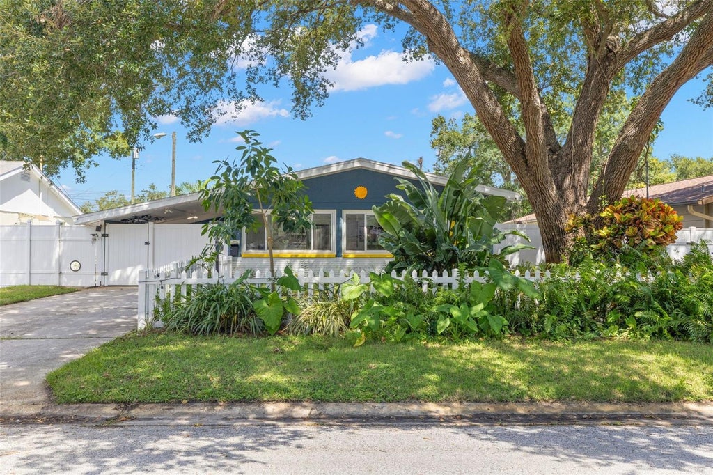 Photo of 613 Cedarwood Street N, St Petersburg, FL 33703 (MLS # TB8552109)