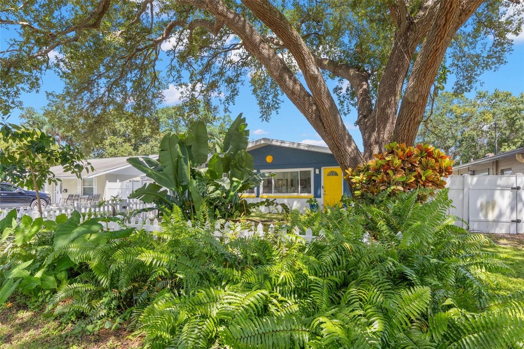 Photo of 613 Cedarwood Street N, St Petersburg, FL 33703 (MLS # TB8552109)