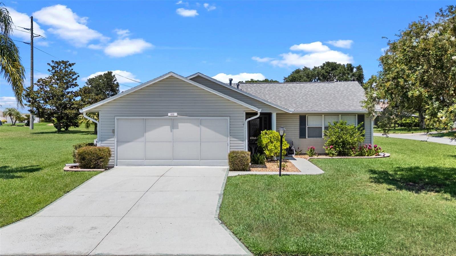 Welcome Home to this beautiful PRIVATE VIEW, 3 bedroom, 2 bathroom, 2 car garage, *CORNER LOT* home in the Gated 55+ community of Highland Lakes! This fabulous property is nestled on a 1/3 of an acre! Lots this size don’t come by often!! *ROOF 2020*. As you walk up the driveway, enjoy all the beautiful landscaping that greets you to your Screened-in Front Door Entryway. Enter through the front door and fall in love with the High Ceilings throughout the Living Room & Dining Room, and pristine LVP Flooring throughout ALL the main living areas and the bedrooms. This home has *NO CARPET*! The kitchen is a dream come true with Stainless Steel Appliances, light cabinets with a backsplash to match, and a unique circular eating space – perfect for entertaining guests and enjoying meals! There’s a large Living Room area PLUS an extra Family Room area in the back of the home, overlooking your beautiful views. The Master Bedroom has high ceilings, 2 large windows, expansive walk-in closet and En-Suite bathroom with large tub and shower. The other 2 bedrooms are conveniently located close to the 2nd bathroom - perfect for guests! The lanai in the back of the home is perfect for grilling and enjoying the Florida weather. With a lot this size, you can enjoy breathtaking private views out of every window of the home. Highland Lakes is a Luxury Gated 55+ Community that offers endless amenities including a BEAUTIFUL GOLF DRIVING RANGE, RV/boat storage, indoor and outdoor pools, state of the art Clubhouse with fitness center, craft room, library, catering kitchen, game rooms & meeting rooms, billiard room with pool tables and ping pong, ballroom with stage for tons of outside entertainment & shows, and so much more! Outdoor fun includes walking trails, ponds for catch and release fishing, lighted tennis courts, softball field, shuffleboard, pickleball, golf driving range, Wood-Working Shop, and covered pavilions with grills to enjoy your Florida sunshine picnics! Call today to see this AMAZING home & schedule your private tour!