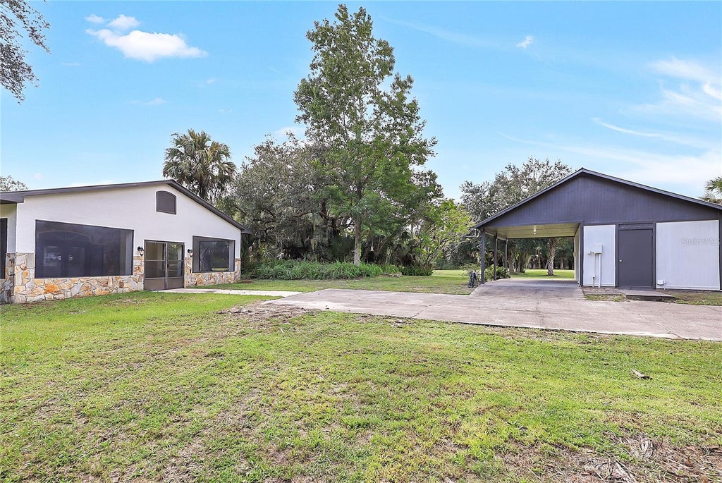 Photo of 2415 Waccassa Street, Geneva, FL 32732 (MLS # O6443279)