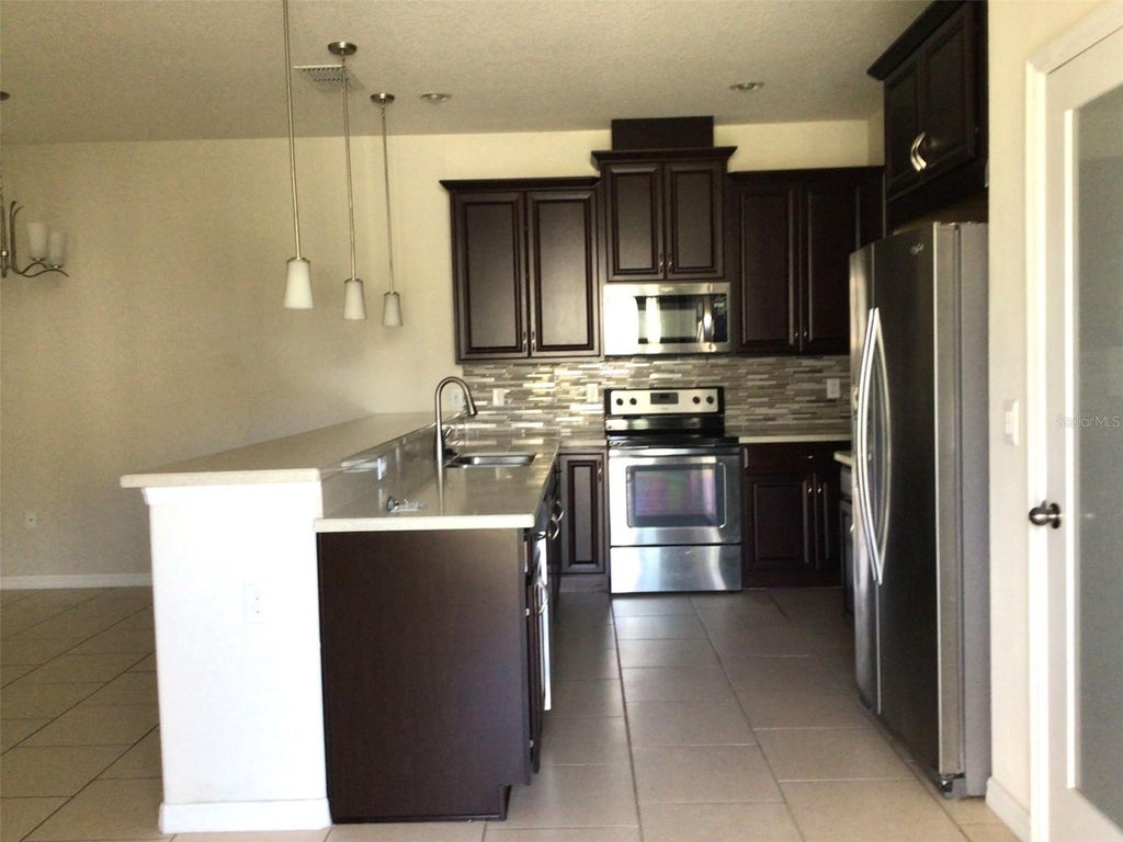 Photo of 2564 Fassona Drive, Kissimmee, FL 34741 (MLS # O6448764)