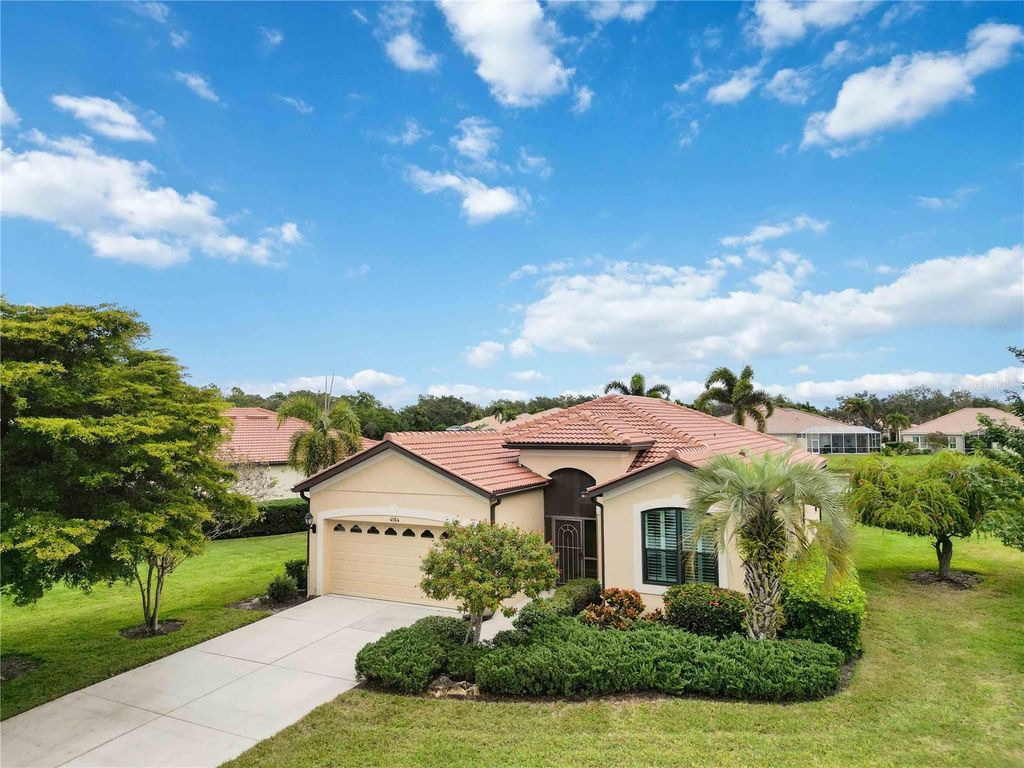 Photo of 4164 Mackay Falls Terrace, Sarasota, FL 34243 (MLS # A4675872)