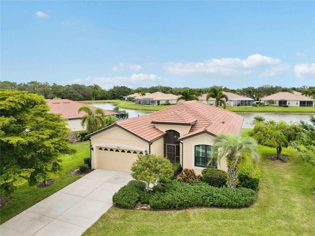 Photo of 4164 Mackay Falls Terrace, Sarasota, FL 34243 (MLS # A4675872)