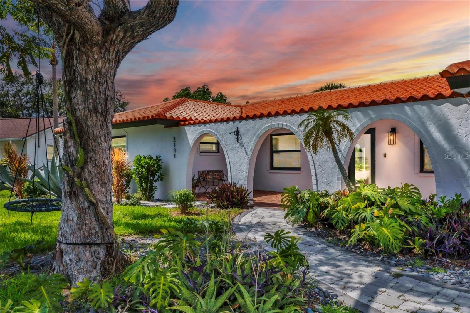 Mediterranean-Inspired Retreat in Southgate – Poolside Living on a Private Cul-de-Sac! Step into timeless elegance with this 4-bedroom + den, 3-bath Spanish-style residence, offering 2800 sq. ft. of warm, inviting living space on an oversized .38-acre lot at the end of a quiet cul-de-sac on Phillippi Creek in Sarasota’s highly desirable Southgate neighborhood—just minutes from Siesta Key beaches, downtown Sarasota, and Southside Village. The backyard evokes the charm of a Mediterranean villa with its stone patio, sparkling pool, and new PebbleTec finish accented by a stunning tile inlay. Relax under the sun, cool off with a refreshing swim, or enjoy the serene natural setting of the creek and visiting wildlife in your expansive, fenced yard. Old World Charm Meets Modern Comfort from the moment you enter, you’re greeted by arched doorways, graceful French doors, and terracotta floors with decorative inlays that set a rich, authentic tone. Natural light fills the home, highlighting its flowing design—perfect for both intimate dinners and grand gatherings. The gourmet kitchen combines rustic warmth with modern updates, featuring a large island, custom cabinetry, walk-in pantry, Italian oven, new dishwasher, granite counters, and stainless steel appliances. Shiplap ceilings and French doors open seamlessly to the lanai, bringing the outdoors in. The spacious primary retreat feels like a private sanctuary, with double French doors opening directly to the pool, dual walk-in closets, and a spa-like bath complete with dual vanities, a soaking tub, and an elegant arched-entry shower. Additional Bedrooms & Flex Space: Bedrooms 2 & 3: Generously sized with a shared updated bath. Bedroom 4: Offers its own ensuite and walk-in closet. Den/5th Bedroom: Ideal as a guest suite, home office, or cozy lounge. A Rare Spanish-Inspired Treasure in the Heart of Sarasota! With its Mediterranean architecture, authentic design details, and resort-style outdoor living, this Southgate residence offers the perfect blend of timeless charm and modern luxury.
From the moment you enter, you’re greeted by arched doorways, graceful French doors, and terracotta floors with decorative inlays that set a rich, authentic tone. Natural light fills the home, highlighting its flowing design—perfect for both intimate dinners and grand gatherings.
The gourmet kitchen combines rustic warmth with modern updates, featuring a massive island, custom cabinetry, walk-in pantry, Italian oven, new dishwasher, granite counters, and stainless steel appliances. Shiplap ceilings and French doors open seamlessly to the lanai, bringing the outdoors in. The spacious primary retreat feels like a private sanctuary, with double French doors opening directly to the pool, dual walk-in closets, and a spa-like bath complete with dual vanities, a soaking tub, and an elegant arched-entry shower. Additional Bedrooms & Flex Space: Bedrooms 2 & 3: Generously sized with a shared updated bath. Bedroom 4: Offers its own ensuite and walk-in closet. Den/5th Bedroom: Ideal as a guest suite, home office, or cozy lounge. A Rare Spanish-Inspired Treasure in the Heart of Sarasota! ??
With its Mediterranean architecture, authentic design details, and resort-style outdoor living, this Southgate residence offers the perfect blend of timeless charm and modern luxury.