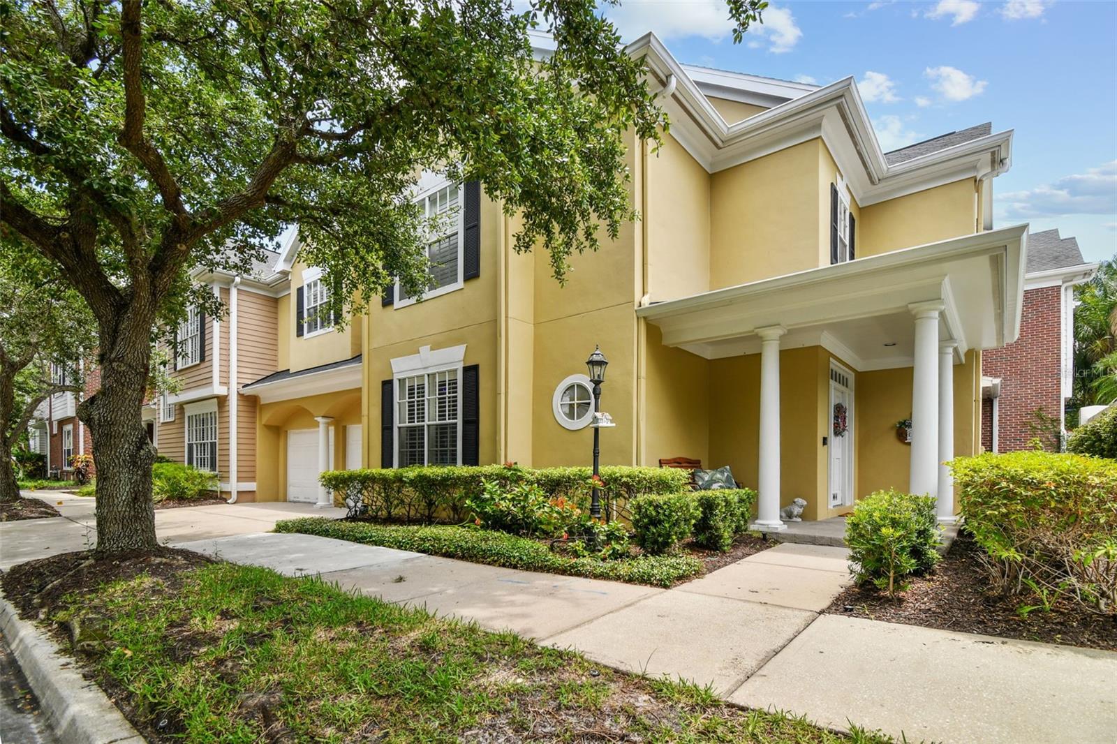 Beautiful corner unit townhome in the luxury guard gated community of Harbour Island. Featuring 4 bedrooms, office, 3.5 bathrooms, and 2-car garage, this is maintenance-free living at its very best. Watch the sunrise on your private patio off the family room and then watch the sunset on your other private patio off the kitchen. Once inside, you're bound to be impressed by the floor to ceiling quality including dark oak stained flooring on the first floor, brand new luxury vinyl flooring throughout the second level, wainscoting, crown molding, plantation shutters, and more. Enjoy meals in the formal dining room, eat-in kitchen, or just at the bar overlooking the family room. In the kitchen you have granite countertops, stainless steel appliances, and a huge pantry area. There is an extra-large office space on the first floor which could easily be converted to a fifth bedroom. Upstairs, you'll find all four bedrooms, including the primary suite with a walk-in closet and updated bathroom. Need to cool off on a hot summer day? The community pool is just a few steps away. All of this located next to Tampa's top destinations including Water Street, Riverwalk, Bayshore Blvd., Amalie Arena, and the area's top dining, shopping, and entertainment. Easy access to the Selmon Expressway and I-275. There's a reason homes in Harbour Bay rarely become available, don't let this one get away!