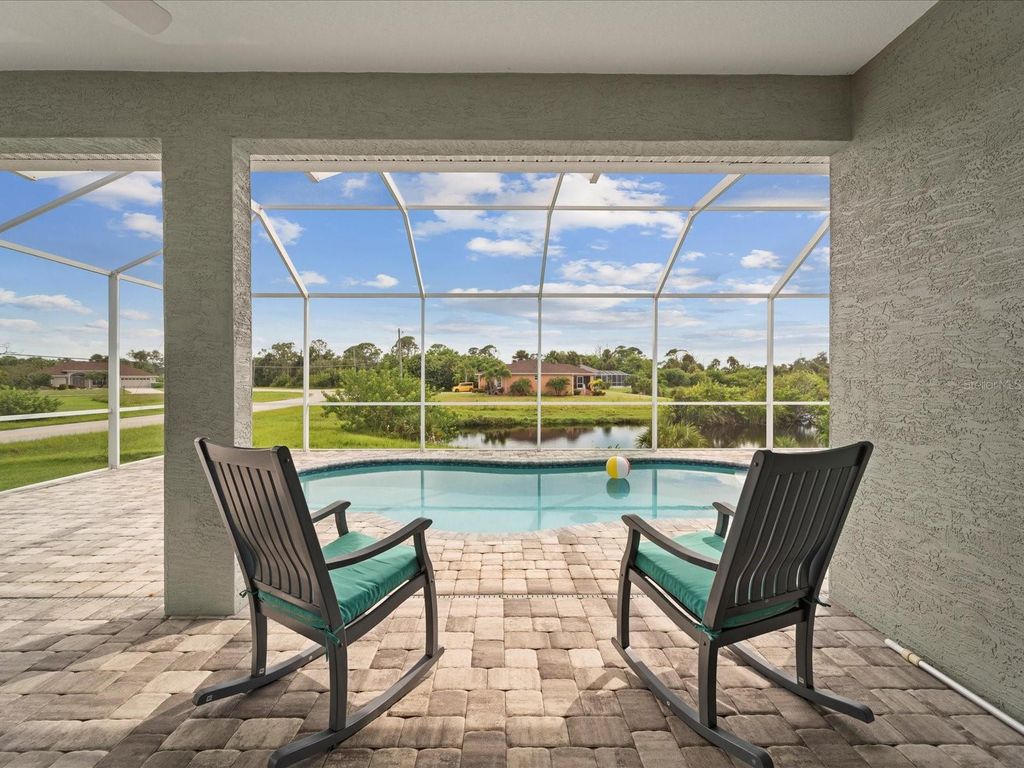 Photo of 127 Rifle Road, Rotonda West, FL 33947 (MLS # C7512046)