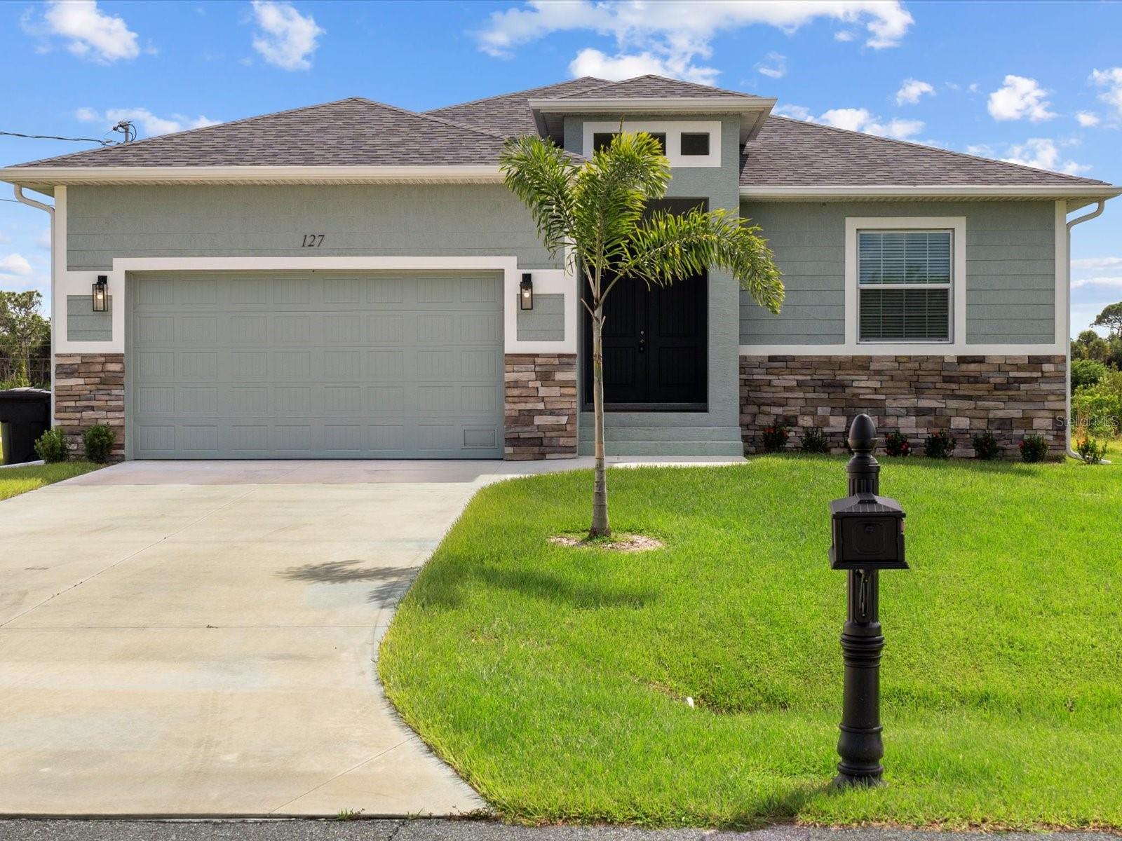 Offered below market value, this BARELY lived in seller’s vacation pool home located in the Beach community of Rotonda Heights on a large corner lot! Just bring your toothbrush to this welcoming home with an open floor plan that throughout entire house has modern, soaring 10' high ceilings with volume trays, 8' doors, millennium durable allergen-free porcelain plank flooring (a MUST in Florida with all the sand), high end QUARTZ countertops, cabinetry that has its own crown molding plus elegant handles on doors & drawers with 42" uppers that are stepped, fully tiled bathrooms, upgraded Stainless Steel appliances with INDUCTION RANGE & air-fry oven option, a large, corner walk-in pantry, 5+ inch baseboards, sliding glass door push button blinds, upgraded full lighting package inclusive of ceiling fans in all bedrooms, living room & lanai! The lanai is complemented with an oversized, full home-width pool deck that has plenty of room for sunbathing and grilling for those who enjoy barbecuing poolside, along with being completely screened in for minimal pool maintenance! Kidney shaped SALTWATER pool with its gorgeous decorative glass accent tile and multi-colored LED lighting also has SUNSHELF with optional umbrella for toe-dipping, toddler play, or fur-family fun! Engineering wise, this beauty was built in 2022 by a Floridian builder who knows what has to be built in Southwest Florida for longevity and durability...hip roof design for long-term discounted insurance rates, off-ridge roof venting so peaks won't blow away, and STEM WALL construction which far exceeds monolithic slabs as sand can wash away but not cement blocks! Built with HURRICANE WINDOWS & SLIDERS, this 3-year old construction brings low-cost insurance and a peace of mind with low-maintenance home ownership. Furnishings optional. Owners fought for their months old home post-hurricane Ian & insurance paid for a new roof in 2024. Promise you will not be disappointed in this gorgeous, fabulously built paradise gem located in the amazing Rotonda Heights community!