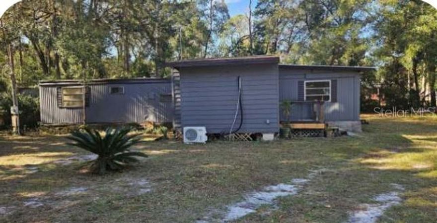 Mobile Home - Built 1970 - 3 Bed 2 Bath - Split bedroom floorplan - Mini Split AC - Well & Septic - No Hoa - .23-acre lot / 10,019 sq ft - 75 x 133 - Zoning R 4 - Taxes -2025 $984 Yearly - Great starter home or potential for the handyman wanting to make a home their own. Mobile Home is situated on a dead-end road for added privacy. Don't miss this opportunity to own your lot, NO LOT FEES and NO HOA. This is a country setting neighborhood but close to town and stores. Just 7 minutes to WinnDixie, CVS, fast foods and other convenience stores. If you enjoy the outdoors Silver Springs Park is only 4 minutes away. Plenty of opportunities to fish around and also swim with the manatees on many of our local springs. Come and see for yourself. CASH offers only.