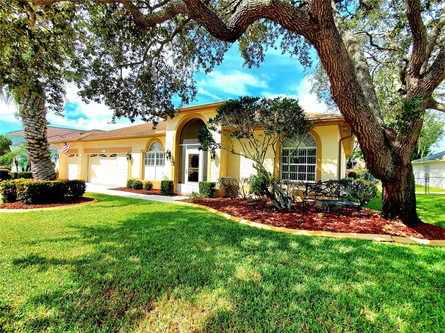 **LARGE TRINITY HOME!** Searching for a spacious house at an affordable price? Here it is!  Never be left in the dark again, fully functioning gas generator! Welcoming covered front entry! This home features a traditional floor plan plus a bonus room perfect for a game room, man cave, or sunroom. The Sunroom is individually temperature controlled and is filled with natural light thanks to a wall of windows that bring the outdoors in. Step out back to a large screened patio—ideal for outdoor entertaining or relaxing. This home offers 4 true bedrooms plus a dedicated home office/library. Cherry wood floors and crown molding runs throughout the home!  Enjoy separate living and family rooms, with the family room boasting a cozy fireplace.  Elegant formal dining room with stunning chandelier!  The kitchen includes a large island with ample bar seating, wood cabinets with new hardware, granite countertops, and stainless-steel appliances. A guest suite is tucked away in the back with convenient patio bathroom access. The master suite is spacious, featuring his-and-her walk-in closets and a luxurious bathroom.  Large walk-in closet with custom built-ins for easy organizing & storage! The laundry room comes equipped with a washer/dryer, utility sink, and extra storage cabinets. The 3-car garage has an epoxy floor, storage cabinets, and shelving for all your needs. Fenced in yard for pets & play!  Sprinkler system on well!  Nestled on an oak-lined street in scenic Trinity Oaks, this home is within a short walk to all three A-rated Trinity schools!  Neighborhood park & playground is just a short walk down the street!