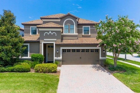 Photo of 9101 El Caro Lane, Davenport, FL 33896 (MLS # O6418197)