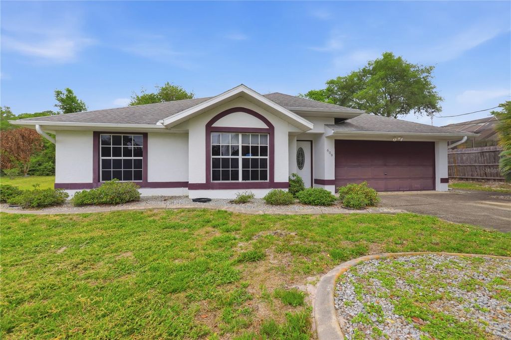 Photo of 609 N 4th Avenue, Deltona, FL 32725 (MLS # V4948636)