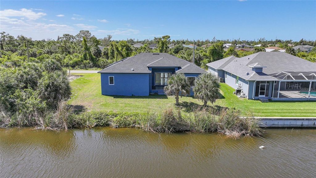 Photo of 15096 Lakeland Circle, Port Charlotte, FL 33981 (MLS # D6147092)