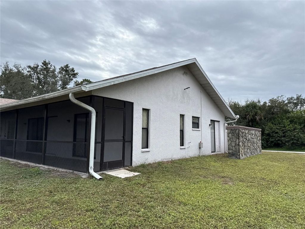 Photo of 21264 Hawthorne Avenue, Port Charlotte, FL 33954 (MLS # TB8458479)