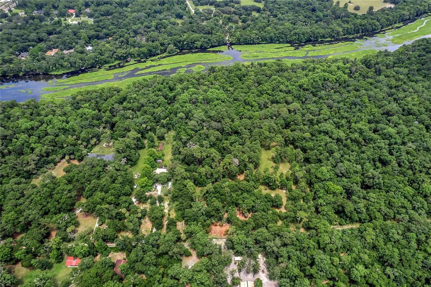 Located on the Wekiva River, this property has so much to offer. This property boasts over 100 ft of water frontage on the Wekiva River. There is also an additional 2.6 acre lot adjacent to this property that is available as well. Pick between one or two building sites with frontage on the Wekiva River. The Wekiva River is a beautiful river that consists of clear flowing water. The property also has a fewer smaller streams running through the edge of the property. The surrounding area is mainly comprised of waterfront homes, rural properties, and several state owned preserves. Wildlife including Whitetail Deer, Osceola Turkey, and numerous other species are routine visitors to this property. This is an opportunity for a buyer to build either one or two single family residences on the Wekiva River. This property has plenty of high and dry land that has been deemed buildable by the county. This location allows for a quiet country setting while still maintaining a short drive to shopping, groceries, restaurants, and many of the best attractions Central Florida has to offer. This property is located just off S.R. 46 and 429. These roads make for easy transit and provide connection directly to I-4 which is less then a 15 minute drive from the property. The adjoining property is also listed V4929364. Call today for a private showing!