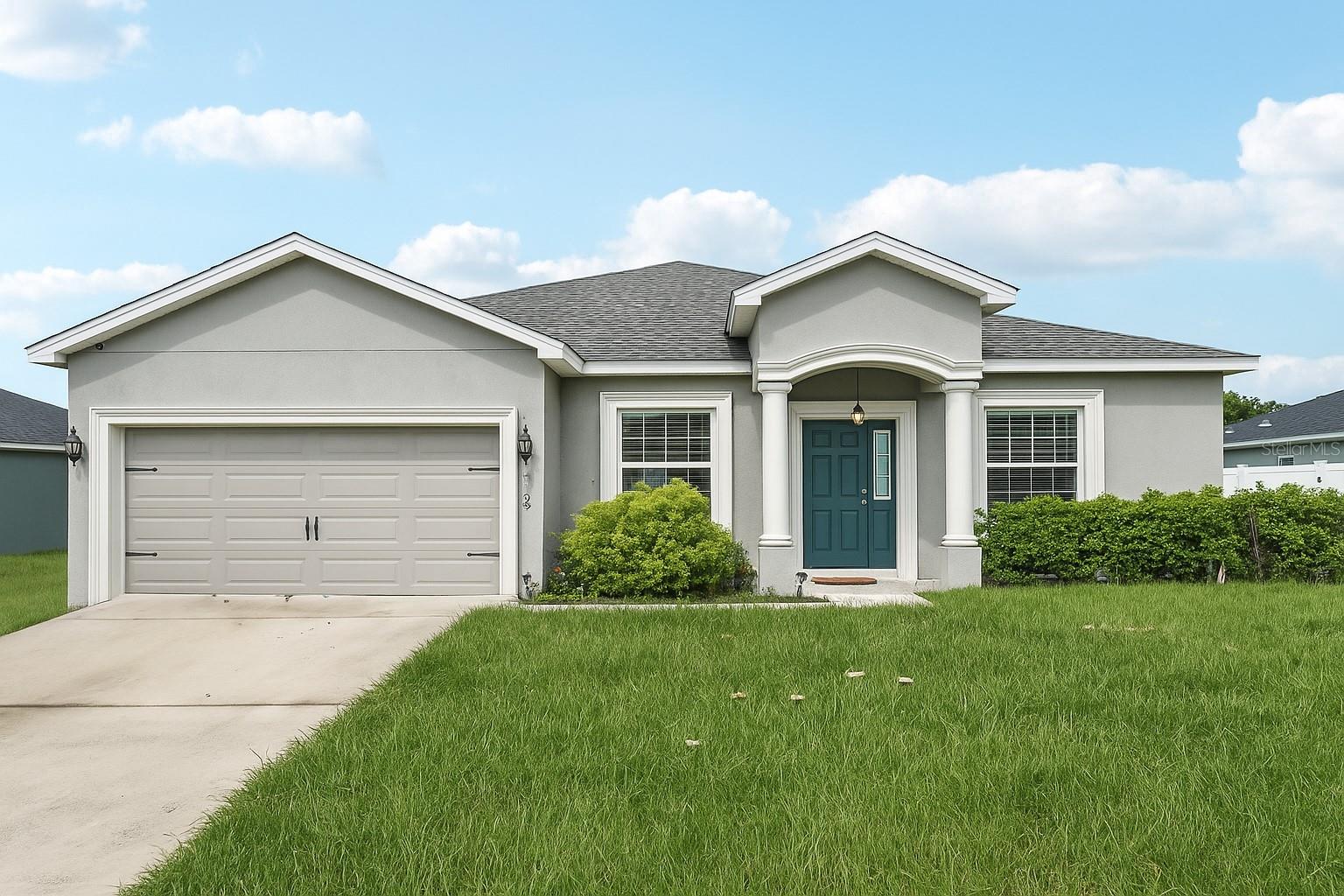 One or more photo(s) has been virtually staged. Nestled in the serene community of Eagle Lake in Polk County, this 2,040 sq ft one-story home offers four bedrooms, three baths, and an inviting open living area perfect for everyday living. The kitchen features white shaker-style cabinets, Samsung stainless steel appliances, a pantry, breakfast bar, and a versatile dining room, while the living areas, baths, and laundry include stylish wood vinyl plank flooring with cozy carpet in the bedrooms. The owner’s suite is a true retreat with a tray ceiling, a walk-in closet, and a spa-like bath with dual sinks and a decorative tiled shower with a glass enclosure. Outdoor living shines here too, with a welcoming front porch and a spacious covered lanai for relaxing or entertaining. Additional thoughtful features include a two-car garage, custom-fit window blinds, architectural shingles, and energy-efficient insulation and windows. Just minutes from the Eagle Lake boat ramp and park, and a short drive to LegoLand, the home is also centrally located between Tampa and Orlando, making it easy to reach theme parks and beaches. Within 20 minutes, you can be in downtown Winter Haven, downtown Bartow, or South Lakeland. Come experience the Central Florida lifestyle and schedule your showing today!