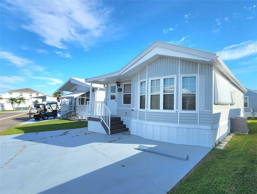 WELL KEPT CHARIOT MOBILE HOME IN ACTIVE 55+ COMMUNITY! One bedroom, 1 1/2 bath turn-key home. There is a comfy living room, family room, & eat-in kitchen with built-in storage. Home has a beachy cottage feel. Unique drapery installation allows family room with sofa bed to be enclosed, providing privacy for overnight guests. Beyond the drapes is a bonus area which could be used as a small office, extra storage, or a craft area. All appliances included. Inside laundry. The bedroom has built-in storage, a vanity area, and an en suite bathroom with tub/shower.  Central A/C (2014). Membrane roofover (2019). All the plumbing was updated in 2013. Priced to sell – move in ready – just bring your clothes and food! SUGAR CREEK COUNTRY CLUB CO-OP HAS LOW HOA FEES of just $525 quarterly which includes water, trash, sewer, basic cable, internet, and grass mowing. There is an active social calendar with fun activities and outings during the winter months. Enjoy this community's proximity to the Braden River and River Links Golf Course. Sorry this is not a dog lot.