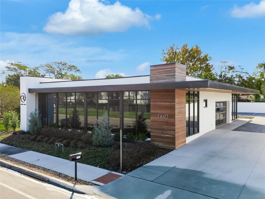 Flagship Office Building for Sale - perfectly positioned for businesses seeking a prestigious address in Winter Park, FL. This expansive property combines cutting-edge design with functionality, offering an ideal environment for forward-thinking companies. <pre></pre>
Strategically located for maximum visibility and adjacent to the highly anticipated Minnesota Row – a transformative, multi-million-dollar, 2.41-acre mixed-use development – this office building places you in the heart of a destination that will become the crown jewel of Winter Park. The Minnesota Row project promises to deliver an exquisite blend of dynamic dining, retail, creative workspaces, lush greenspaces, and a vibrant pedestrian gathering hub. As this revitalization unfolds, Minnesota Avenue will undoubtedly emerge as the most coveted business district in Winter Park. <pre></pre>
Winter Park’s reputation as a cultural and economic powerhouse, combined with its proximity to Orlando's Executive & International Airport, ensures a thriving environment for business success. The area’s exclusive dining, boutique shops along Park Avenue, and an abundance of recreational facilities – including pristine golf courses and scenic parks – presents an extraordinary lifestyle for executives and professionals. These enviable amenities attract top-tier companies and high-net-worth individuals, making this address one of the most desirable in Central Florida. <pre></pre>
Spanning 2,700-square-feet, this office building exudes sophistication at every turn. Designed to perfection, it combines timeless mid-century elegance with contemporary luxury. Floor-to-ceiling windows shower the interior with natural light, while 10-foot-high ceilings enhance the sense of openness. Rich walnut interior doors and paneling set the tone for an elegant and functional environment, with a grand reception welcome area, a fully equipped breakroom, two private washrooms, six expansive office/patient rooms, and a versatile meeting room separated by foldable glass panel technology. <pre></pre>                                                   
The centerpiece of the open office area is a striking hanging art installation, inspiring business creations and gatherings. The corner office executive suite is a testament to luxury, offering a private garage entrance for added exclusivity. Inside, you’ll find a personal sanctuary – a spa-like en-suite bathroom, walk-in closet, and an overall design that invites relaxation and focus - the perfect retreat for leadership.<pre></pre>          
The exterior is equally impressive, the property boasts sleek LPE tongue-and-groove paneling, a paver parking lot with 10 dedicated parking spaces, and a climate-controlled 2-car garage. This meticulously crafted office building is the ideal canvas for any visionary business, combining timeless design with unparalleled amenities, and offering an extraordinary opportunity for those looking to establish their mark. <pre></pre>
Experience the ultimate in style, sophistication, and business potential at 1460 Minnesota Avenue.