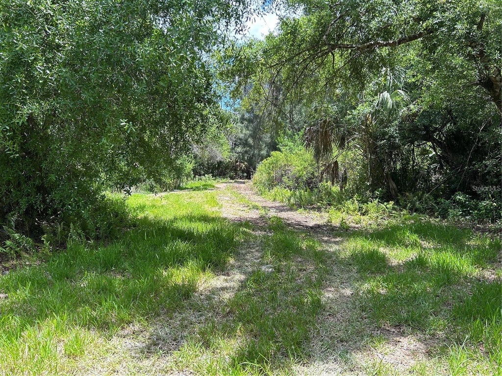 Photo of 7022 Riverside Drive, Punta Gorda, FL 33982 (MLS # TB8558601)