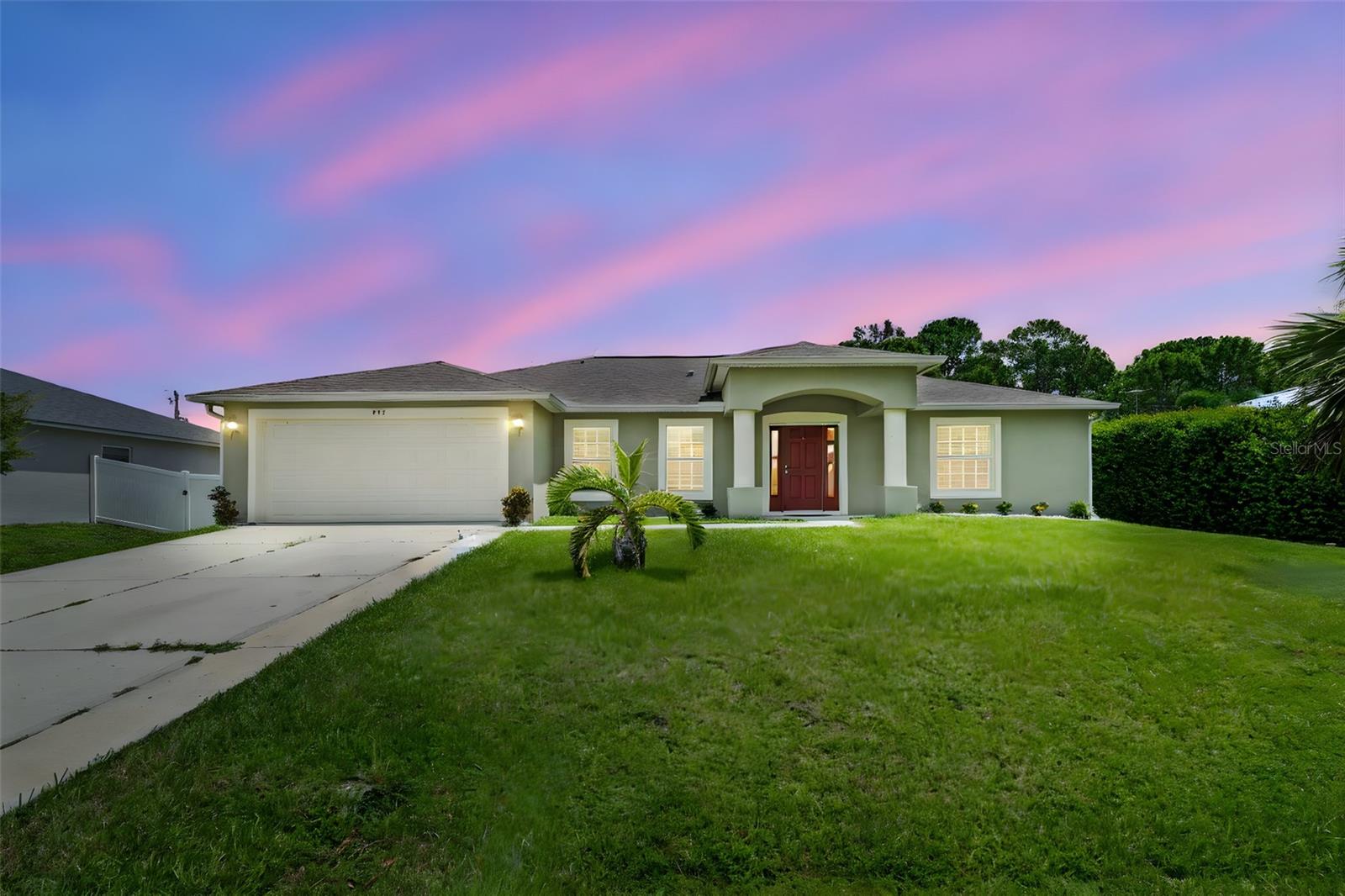 With plenty of time before the Holidays, here sits a well-designed 3-bedroom home with a flexible bonus space, home office? gym? secret Lego room maybe? While also keeping space for an open concept and dedicated dining space. Built in 2020 and offering 2,080 sq ft, a Full vinyl FENCED yard, and huge Kitchen ISLAND this home begs to have memories made in it. The primary suite provides space while also offering an easy to access outdoor SCREENED patio space. Plus the convenience of nearby parks, Publix, restaurants, and shopping. Just a short drive to Orlando, the Kennedy Space Center, and the beaches, this location offers both quiet living and easy access to adventure. With a manageable yard and plenty of indoor space, this is a home that fits a variety of lifestyles. Schedule your showing today! Warning: touring this home may result in spontaneous nesting urges. Proceed with excitement.