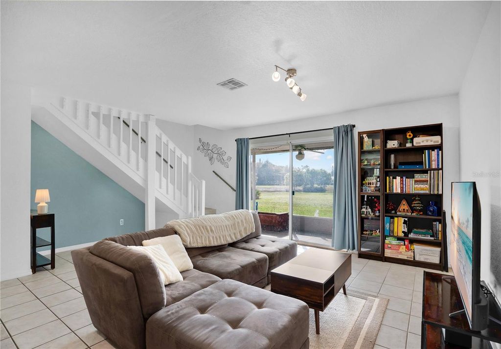 Photo of 12380 Shady Spring Way #105, Orlando, FL 32828 (MLS # O6389446)