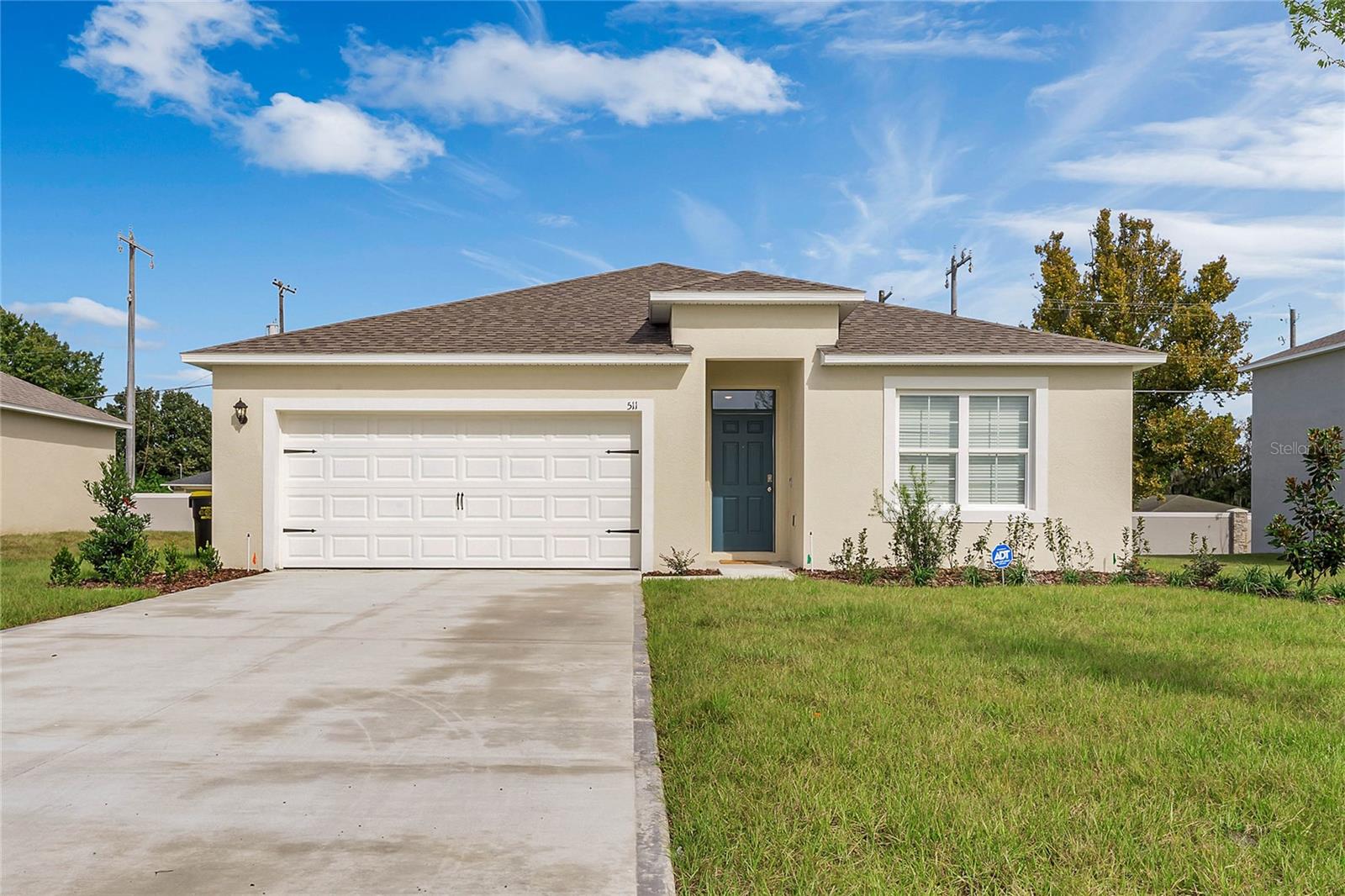 Nestled in the heart of Auburndale, this stunning 4-bedroom, 2-bathroom single-family home offers over 1,851 square feet of thoughtfully designed living space on a spacious .21-acre lot. Located at the end of a peaceful cul-de-sac, this 2021-built gem is in pristine, like-new condition, providing both the charm of a newer build and the warmth of a welcoming neighborhood.
Step inside to be greeted by beautiful ceramic tile flooring that flows seamlessly throughout the main areas, creating a clean, modern aesthetic. The open floor concept invites you into a spacious, airy living space, perfectly designed for both relaxing evenings and lively gatherings. At the heart of the home is a well-appointed kitchen, featuring ample countertop space and cabinetry, ensuring your culinary experiences are both enjoyable and efficient.
The master suite is a true retreat, with double vanities offering elegance and convenience in the en-suite bathroom. Each additional bedroom is generously sized, ensuring comfort for family or guests. Step outside into the open backyard, ideal for entertaining, gardening, or simply enjoying the Florida sunshine.
As part of this serene community, residents have access to a sparkling community pool—perfect for cooling off on warm days or connecting with neighbors. Auburn Grove is conveniently located close to major highways, offering easy access to nearby shopping, dining, and entertainment.
This home is truly a masterpiece of modern living in a peaceful community setting. Schedule a tour today and make 511 Auburn Grove Terrace your next dream home!