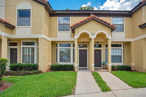Photo of 6007 Scotchwood Glen #39, Orlando, FL 32822 (MLS # O6416271)