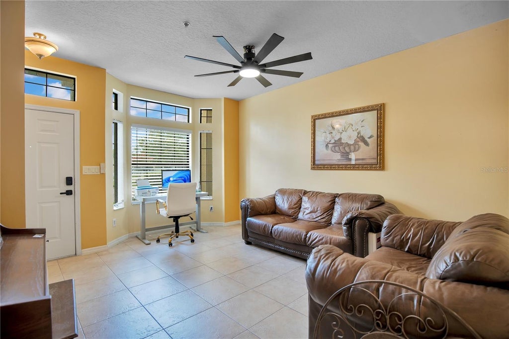 Photo of 6007 Scotchwood Glen #39, Orlando, FL 32822 (MLS # O6416271)