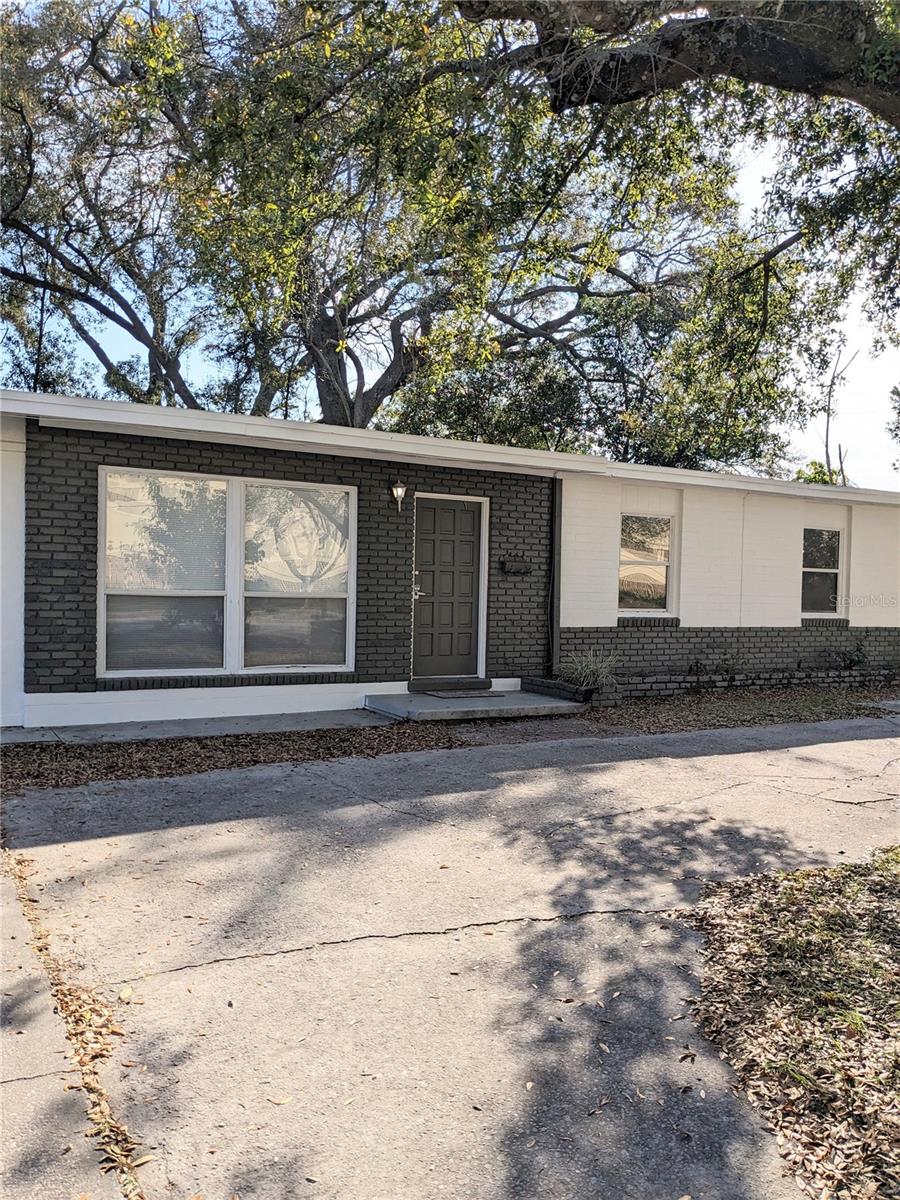 Welcome to this fully updated 3-bedroom, 2-bathroom home located in a quiet and desirable neighborhood. The bright open layout features modern finishes and fresh interior updates throughout, while each bedroom offers generous space and natural light for comfortable living. Step outside to a private fenced backyard, ideal for entertaining guests, enjoying outdoor activities, or simply relaxing in your own space. Conveniently situated just minutes from Downtown Orlando, the Milk District, Lake Eola, and Baldwin Park, this home offers easy access to shopping, dining, parks, and major highways. It is also close to AdventHealth Orlando, a top-ranked medical facility, and several Orlando Health hospitals, with Colonial Plaza Market Center and nearby retail outlets providing an abundance of shopping and dining options. This beautifully updated property combines comfort, convenience, and location. As an added benefit, an attached studio with its own entrance, full bath, and kitchenette is also available for rent( $1100) offering flexibility for extended family, guests, or independent living.