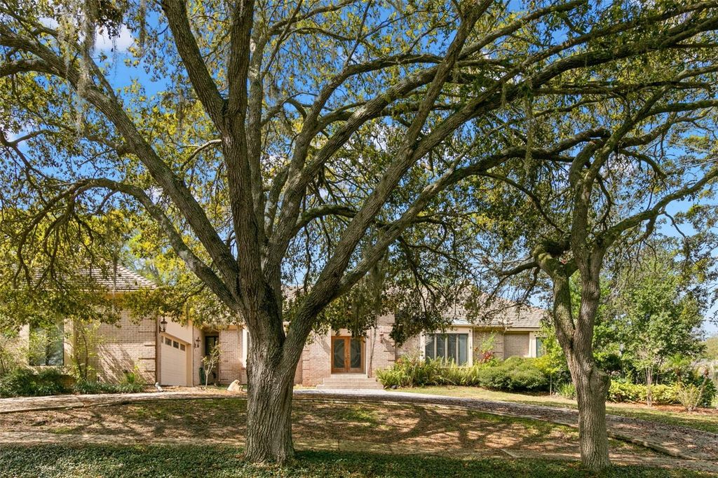 Photo of 3498 Shoreline Circle, Palm Harbor, FL 34684 (MLS # TB8437347)