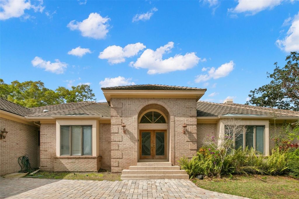 Photo of 3498 Shoreline Circle, Palm Harbor, FL 34684 (MLS # TB8437347)