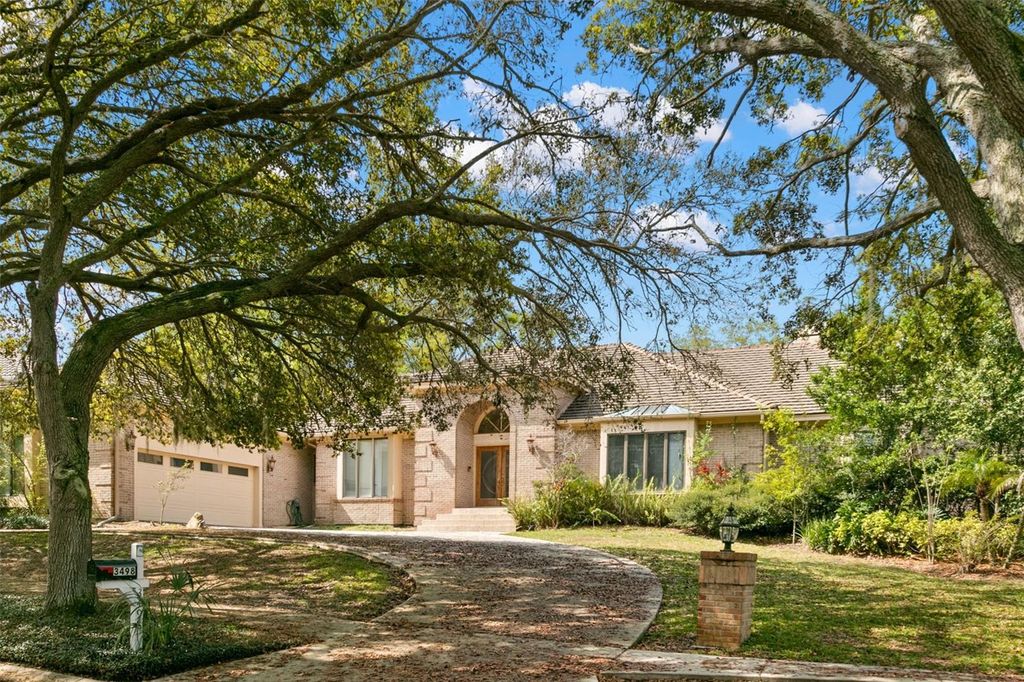 Photo of 3498 Shoreline Circle, Palm Harbor, FL 34684 (MLS # TB8437347)