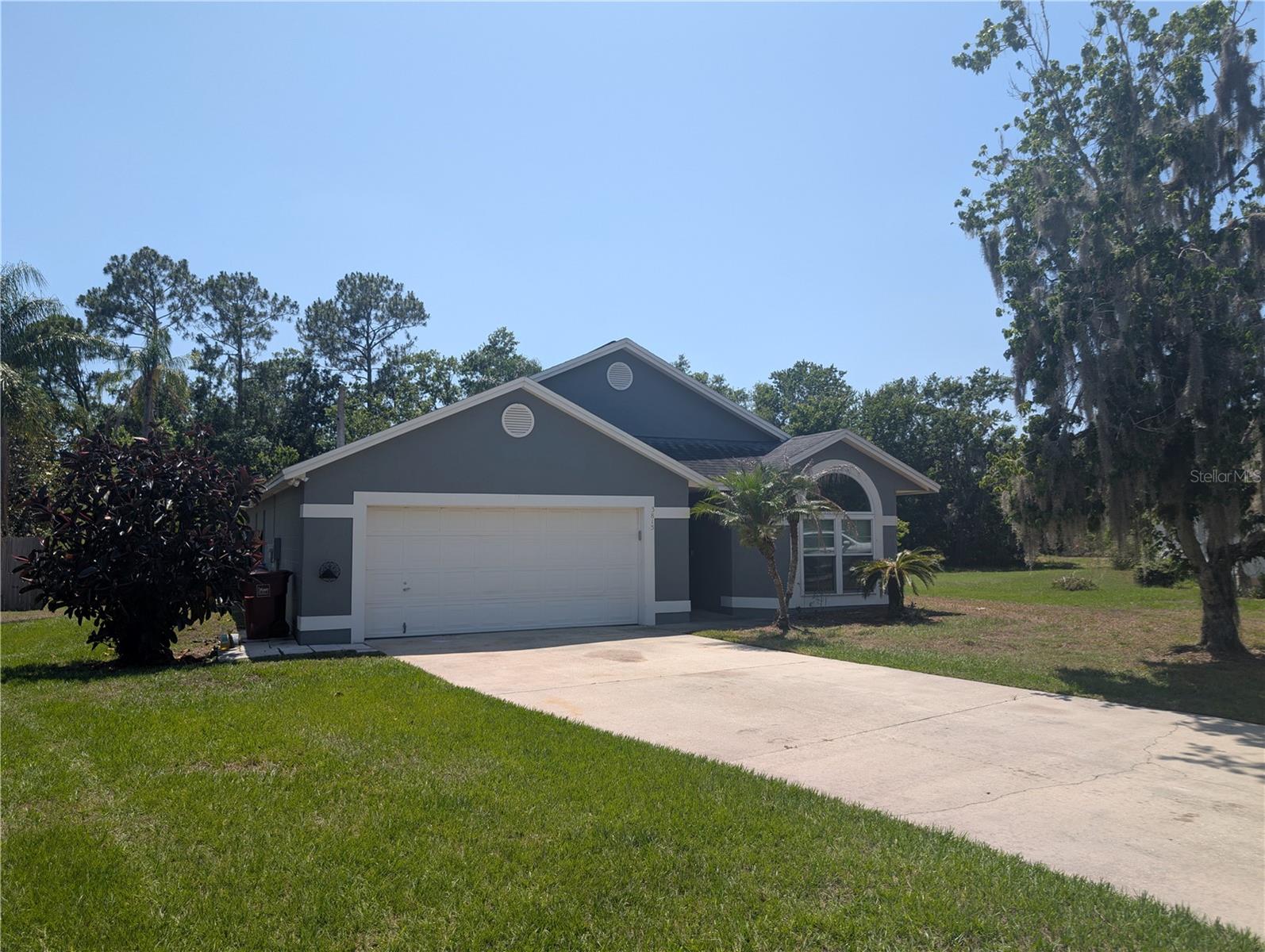 Looking for peace and privacy? No HOA, This updated 3-bedroom, 2-bath home at the end of a quiet cul-de-sac offers just that—and more. Enjoy an extra-large screened-in patio overlooking a serene, bird-friendly backyard that’s perfect for relaxing or entertaining. Inside, the split floor plan features soaring ceilings, fresh interior paint, and a mix of tile, waterproof vinyl, and wood flooring—no carpet! The kitchen includes new cabinets and countertops, and both bathrooms have been updated with brand-new vanities and countertops. Generously sized bedrooms complete this charming and functional home. Non-smoking residence. No cats, dogs ok. Washer/Dryer Hookup available. At time of move-in, a $150 tenant processing fee will be due along with rent and deposit(s). Schedule your private showing today!