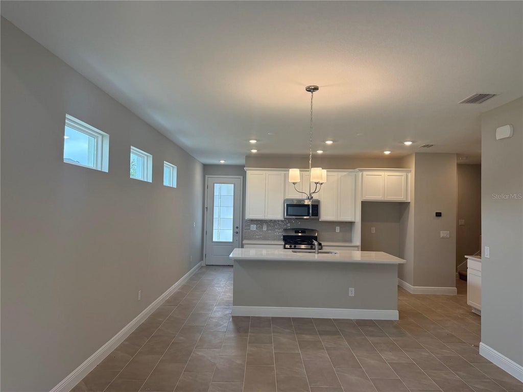 Photo of 3704 Nandina Circle, Sun City Center, FL 33573 (MLS # TB8551321)