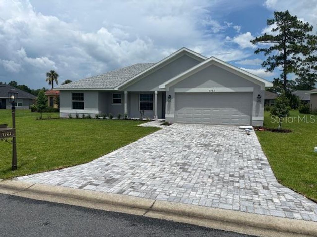 Photo of 7781 SW 180th Circle, Dunnellon, FL 34432 (MLS # OM700616)