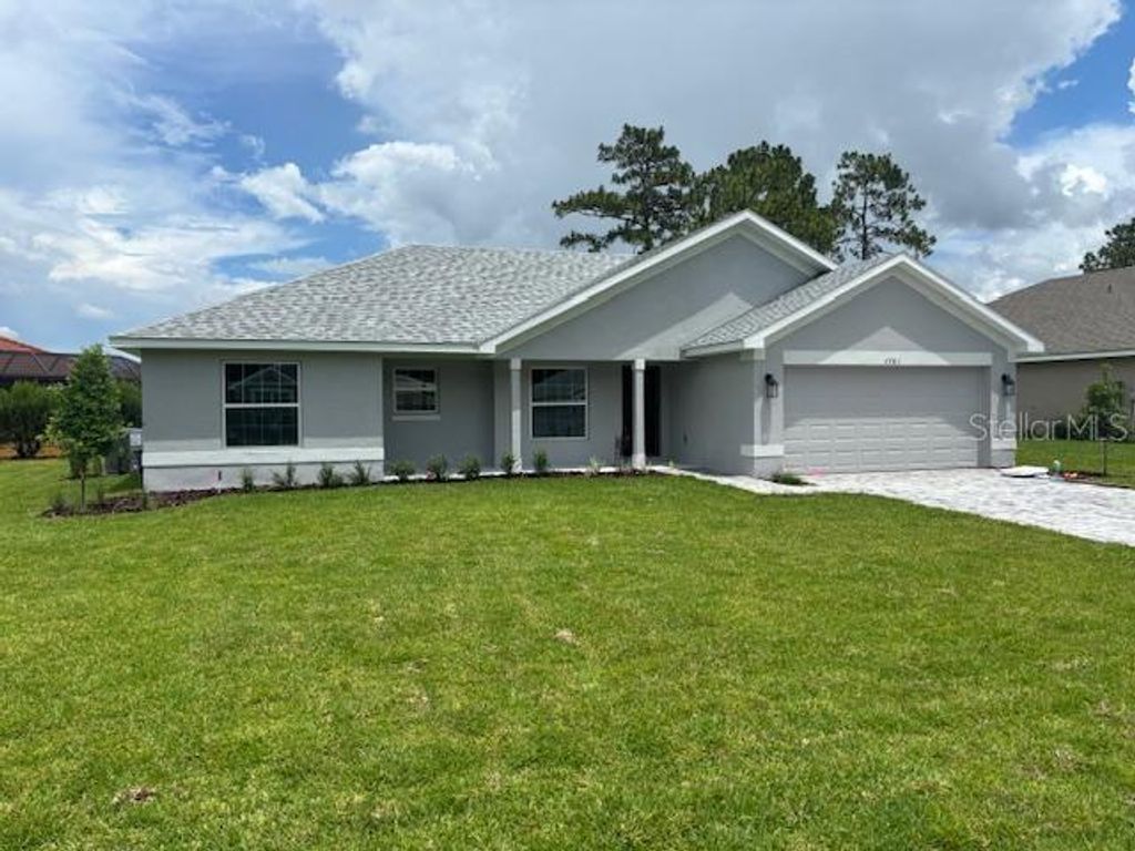 Photo of 7781 SW 180th Circle, Dunnellon, FL 34432 (MLS # OM700616)