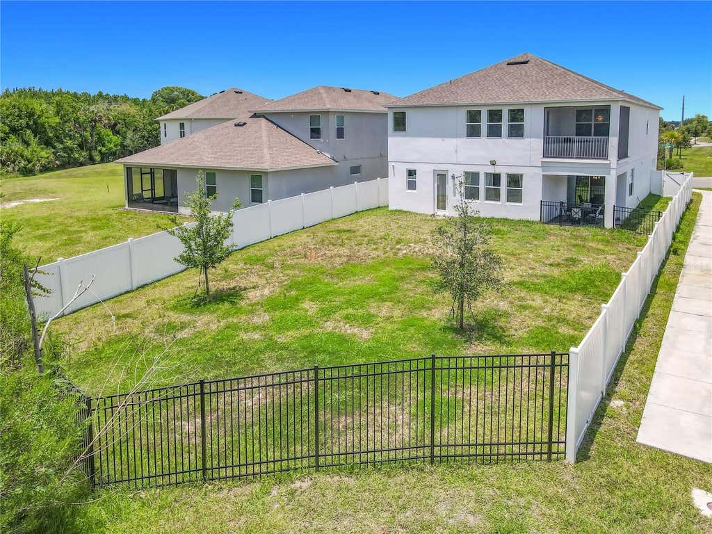 Photo of 720 Treehouse Loop, Debary, FL 32713 (MLS # O6428283)