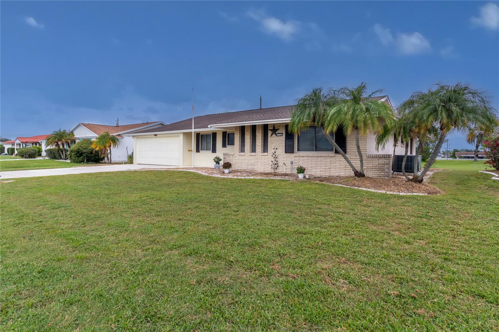 No HOA nor CDD fees! Overlook retired golf course from your concrete patio. This spacious 2 bed, 2 bath home with an eat-in kitchen, formal dining room, living room, family room, 25x15 Florida Room and a 19x12 air-conditioned utility/laundry/storage/craft room plus a 2-car garage. Eat-in kitchen includes a large pantry. Main bedroom has ensuite bathroom and 2 walk-in closets. Oversized laundry room includes a utility sink and countertop area that could become your craft area. Over 100 clubs for you to participate in!
Be a part of the award-winning community! Realtor.com rated Sun City Center as the country’s No. 1 community for retirees last year. (2024). The ranking was given for a number of reasons, including Sun City Center’s close proximity to Tampa, its easy access to area beaches, housing costs and an abundance of outdoor activities. Golf carts are second mode of transportation in Sun City Center. Just a short drive to award winning beaches, Disneyworld or the theatre in Tampa or Sarasota. Furniture, golf cart and car are available via a separate contract. Home is being sold As Is for seller convenience. Listing will close while still in probate.