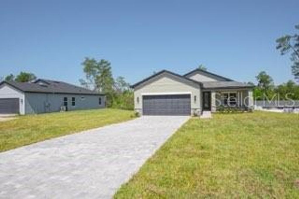 Photo of 602 Marion Oaks Lane, Ocala, FL 34473 (MLS # P4937744)