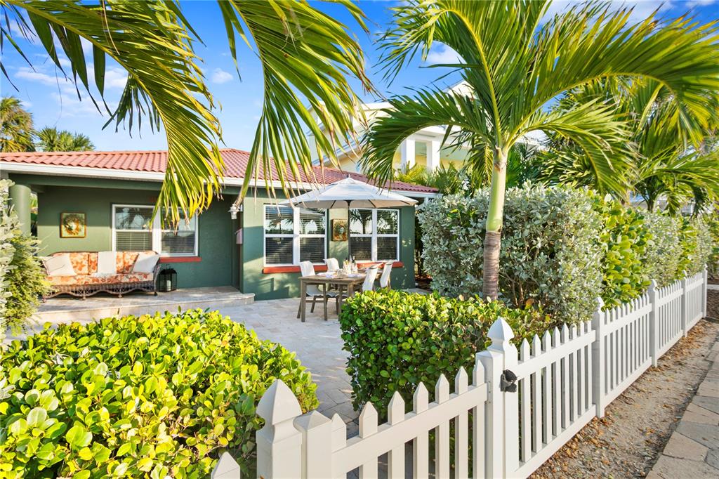Welcome to the Beach House! The road narrows when you go south of The Don CeSar, it takes you back in time as you pass the promenade of Palm Trees that lead you to this quaint and charming community of Historic Pass A Grille. Perfectly situated on the southern most tip of the island with no homes between you and the Gulf of Mexico with the famous white sand beach and award winning sunsets. Just a few blocks to 8th Ave with the charming shops and fabulous old fishing village style restaurants. This 2 bedroom 1 and a half bath home with a 1 bedroom 1 bath casita guest house is perfect for entertaining with amazing indoor and outdoor living! Plenty of on site parking. Pass A Grille has a long history of premier fishing so a fun pastime is just a few blocks to Merry Pier offering daily sunset or fishing charters or just grab a pole and fish off the expansive fishing piers along the way. This home has been loved by the past owners and it's time to pass on the opportunity for many more memories and traditions to follow. Although most enjoy walking, biking or golf carting around town, there is also so much to do in the Tampa Bay area. Sneak over to Downtown St Petersburg with world renowned museums, trendy restaurants, award winning sports teams in the area, Tampa Bay Buccaneers, Rays, Rowdies and Lightning. Tampa Int'l is 35 mins away, making business or personal travel a breeze.