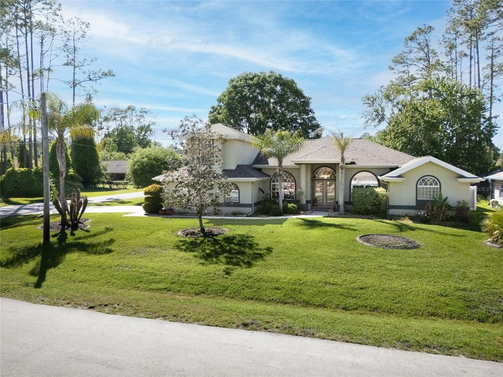 Photo of 40 Edgewater Drive, Palm Coast, FL 32164 (MLS # FC317640)
