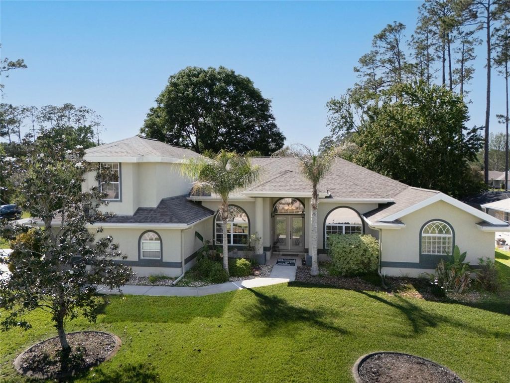Photo of 40 Edgewater Drive, Palm Coast, FL 32164 (MLS # FC317640)